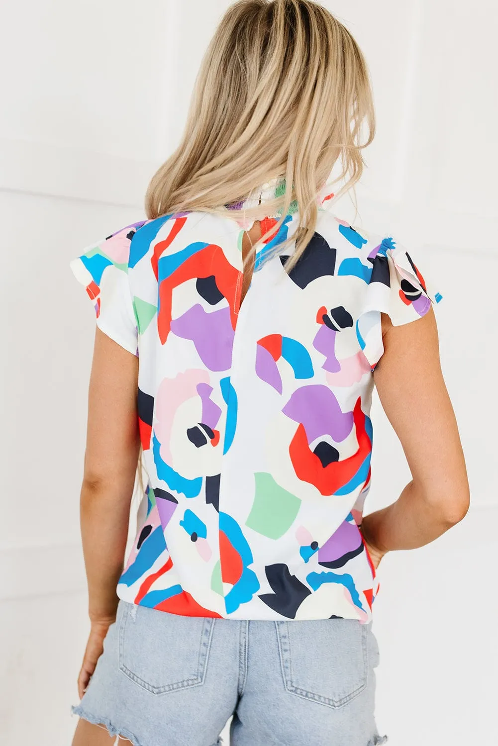 Abstract Print Smocked Blouse with Ruffle Sleeves