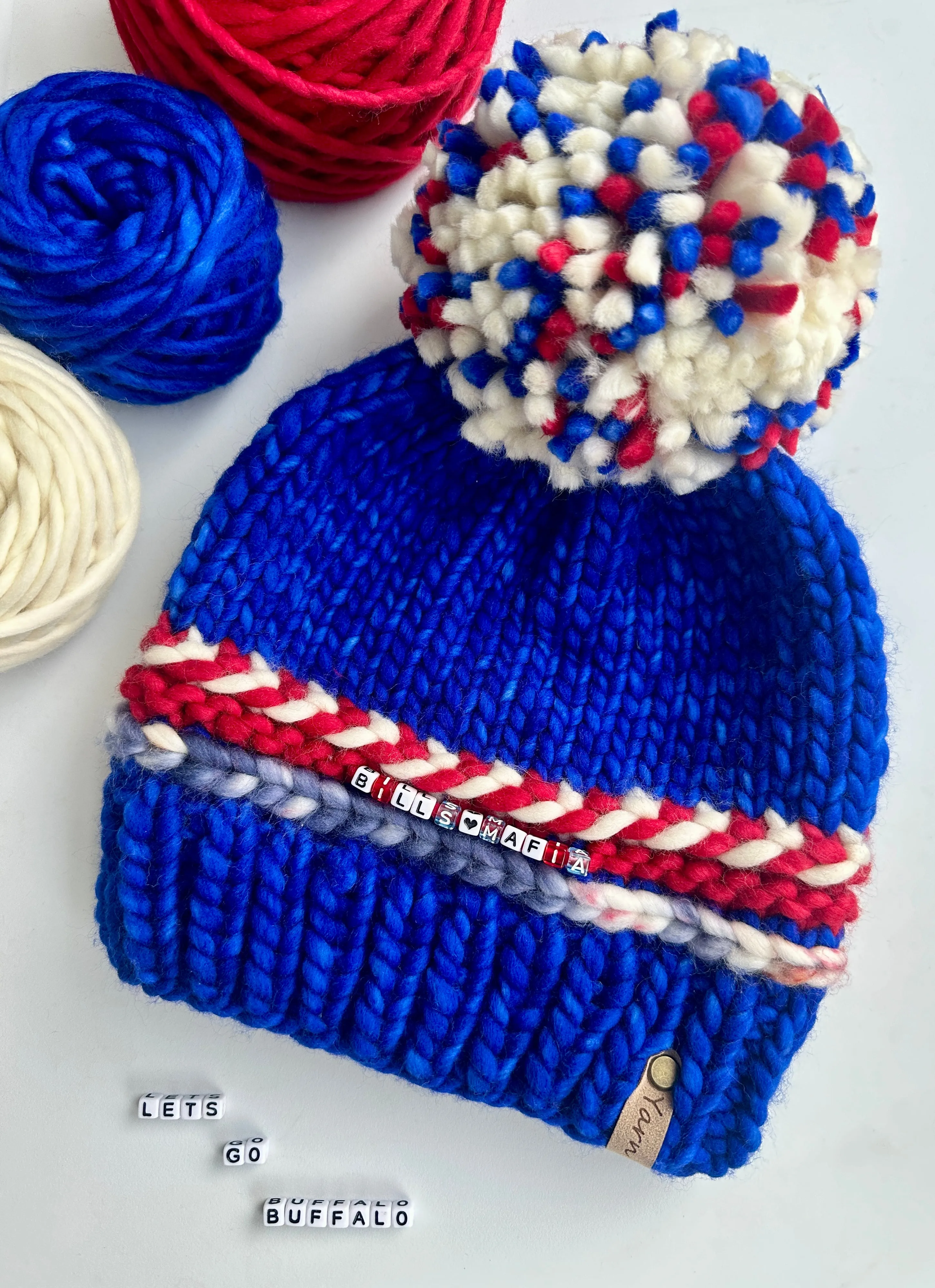 Sports Themed friendship bracelet merino wool hat with merino wool pom