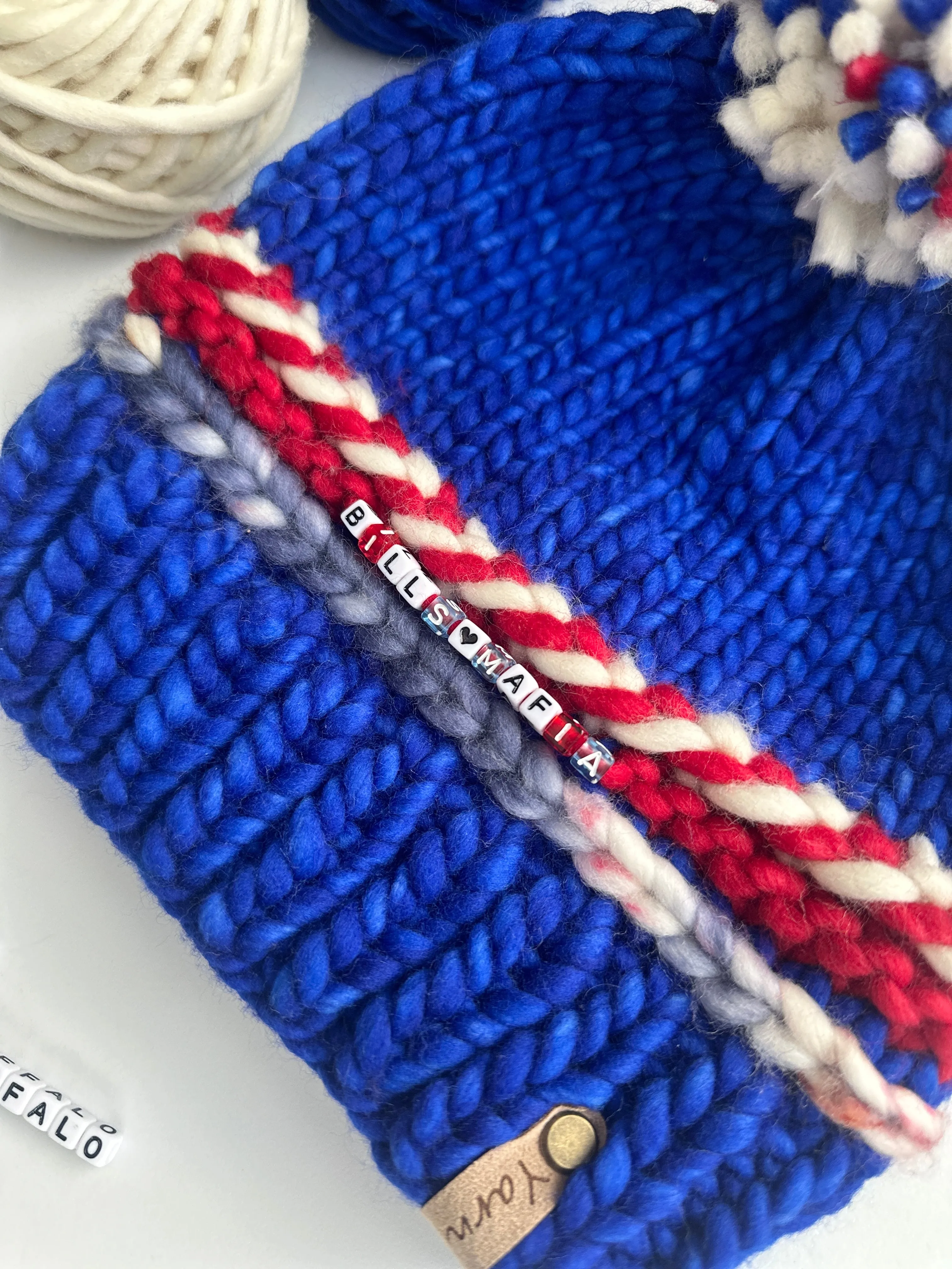 Sports Themed friendship bracelet merino wool hat with merino wool pom